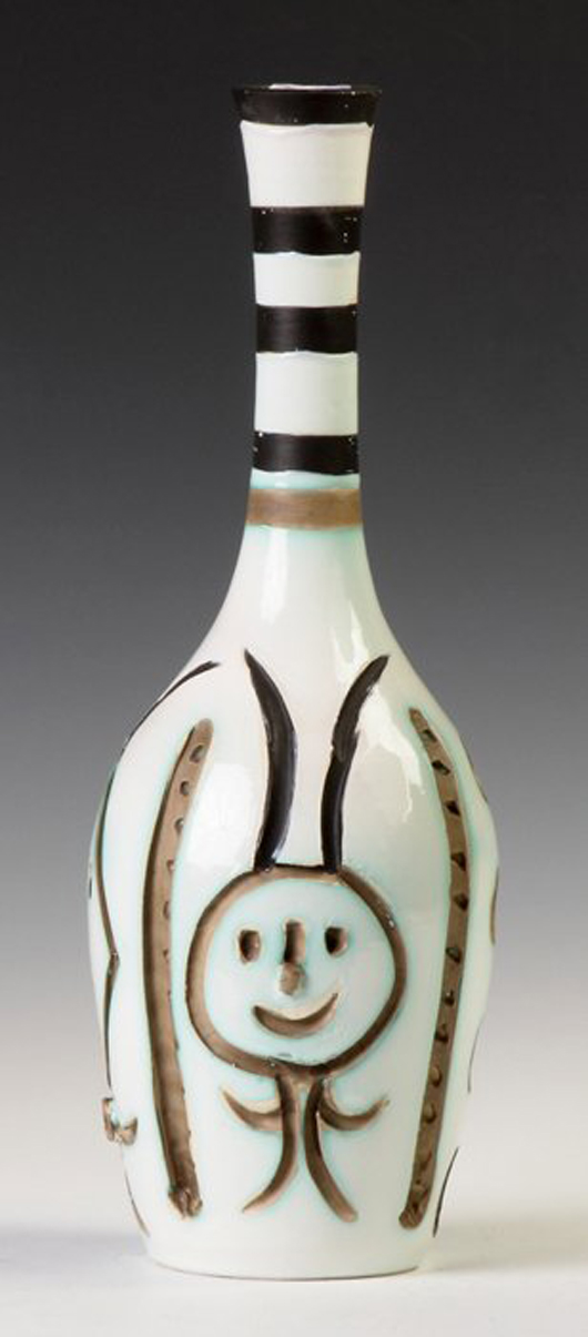 Engraved bottle, executed circa 1954 by Pablo Picasso, marked on bottom #147/300. Price realized: $14,000. Cottone Auctions image.